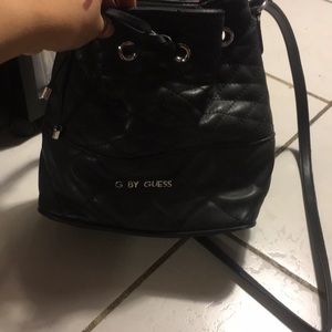 Black Guess bucket bag.